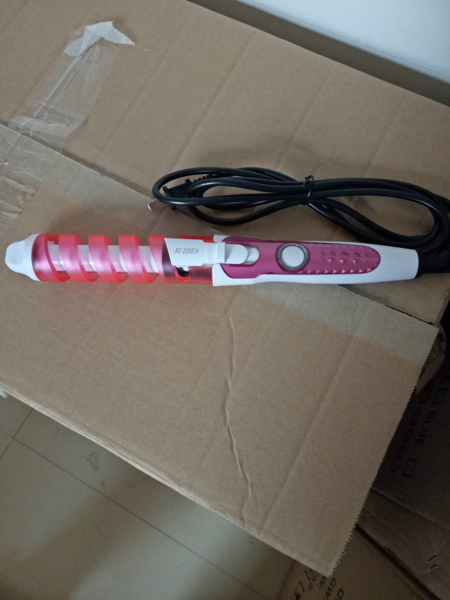 Spiral curling iron